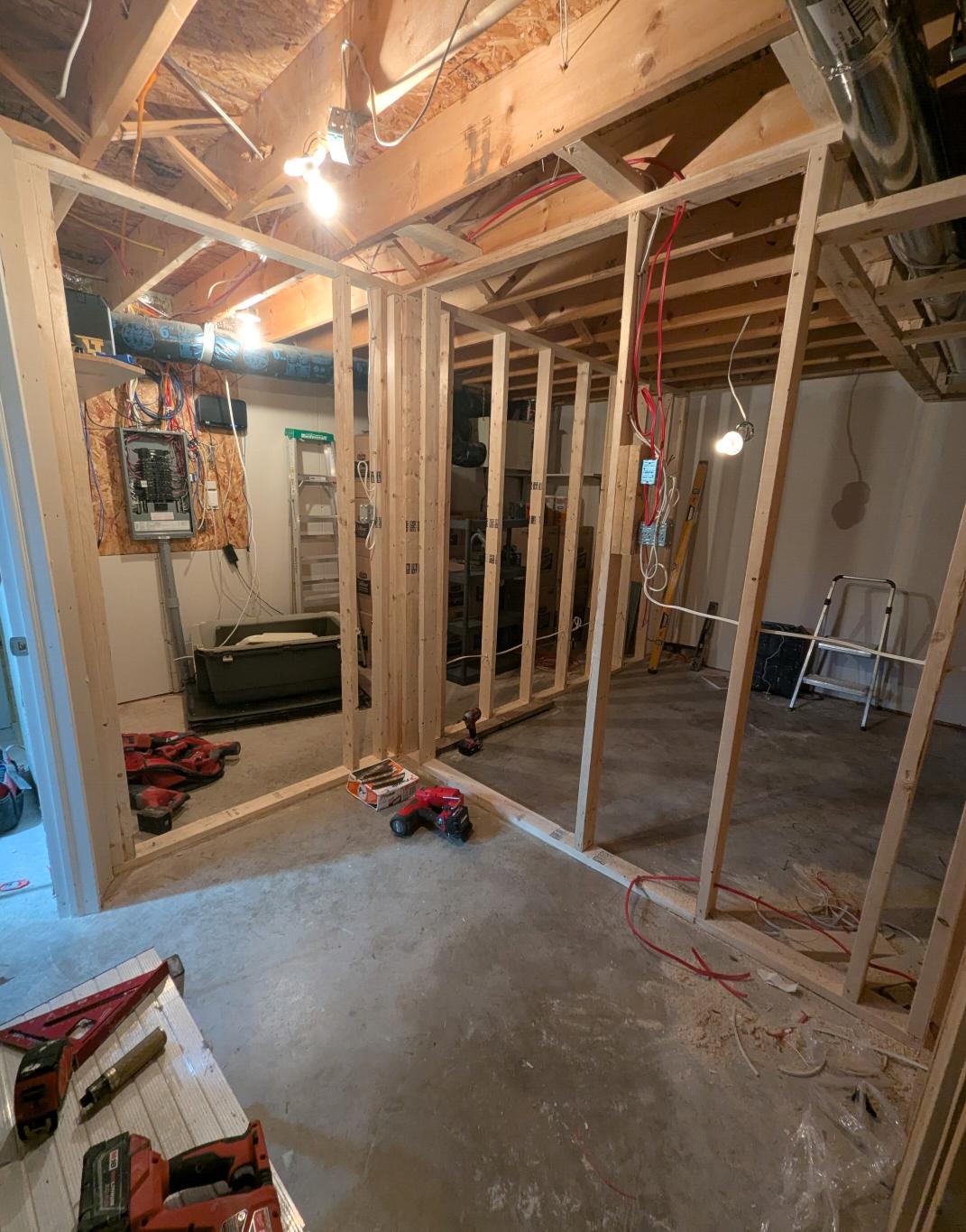 Basement framing and electrical rough-in by Valhalla Construction, Dieppe NB