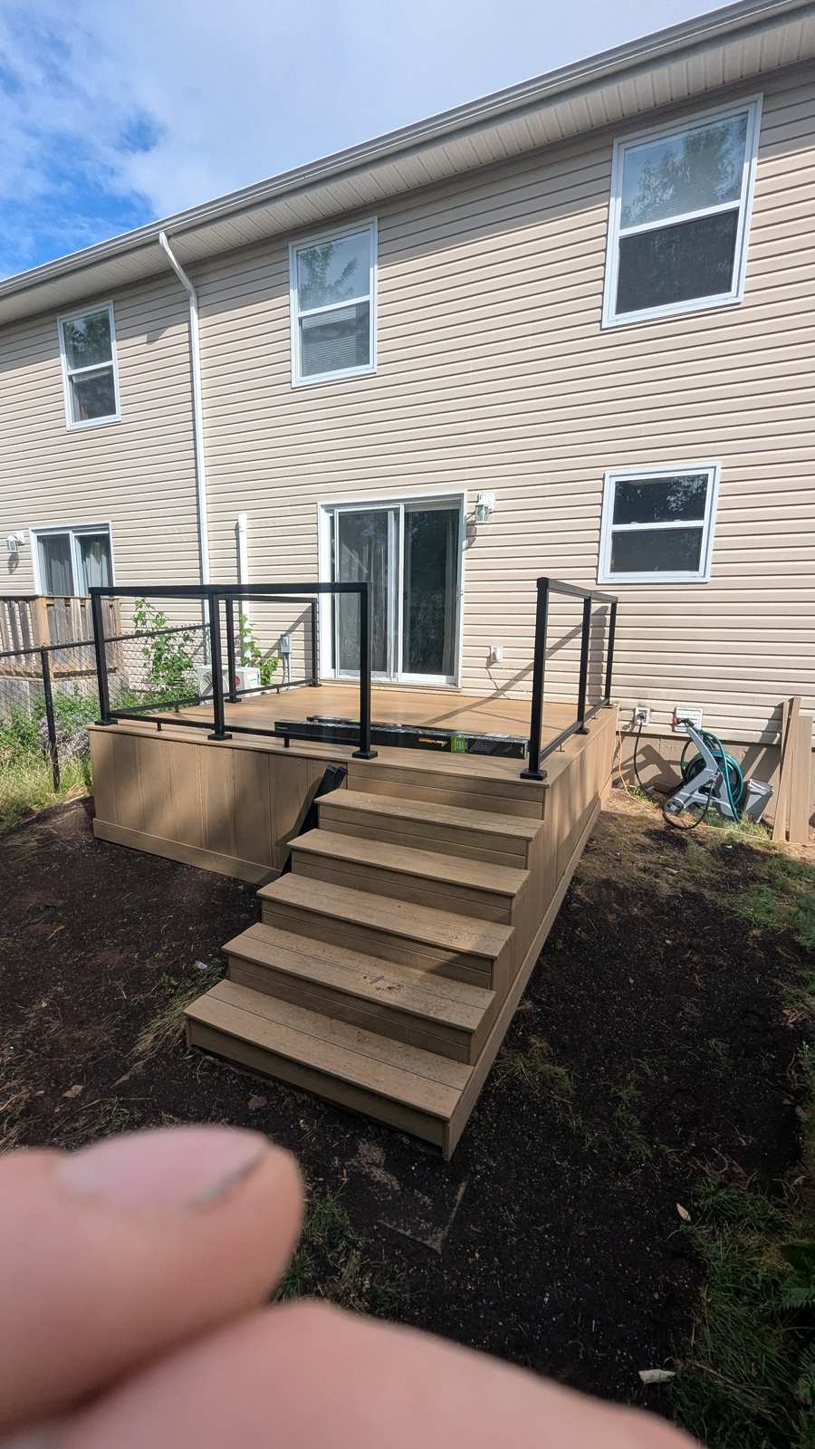 Finished composite deck with black aluminum railing, Chianti Street, Dieppe NB