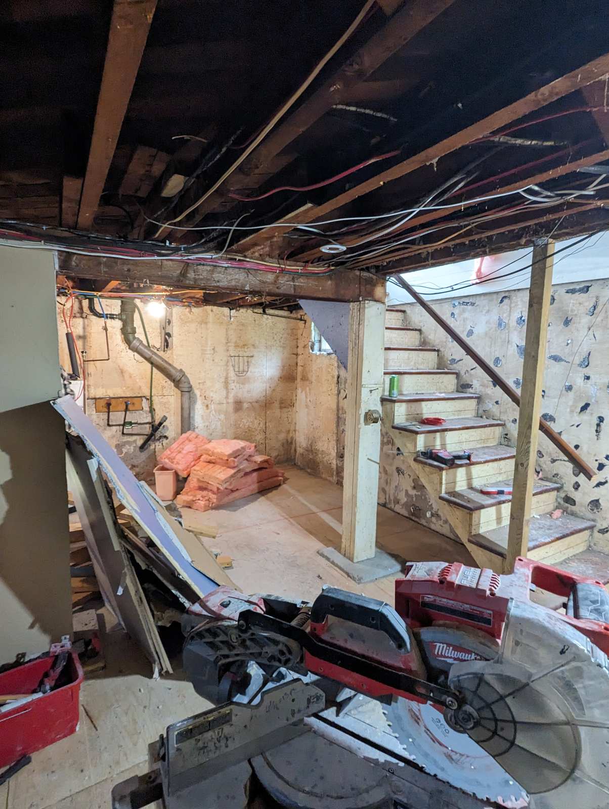Basement ceiling opened to joists during demolition, Riverview NB