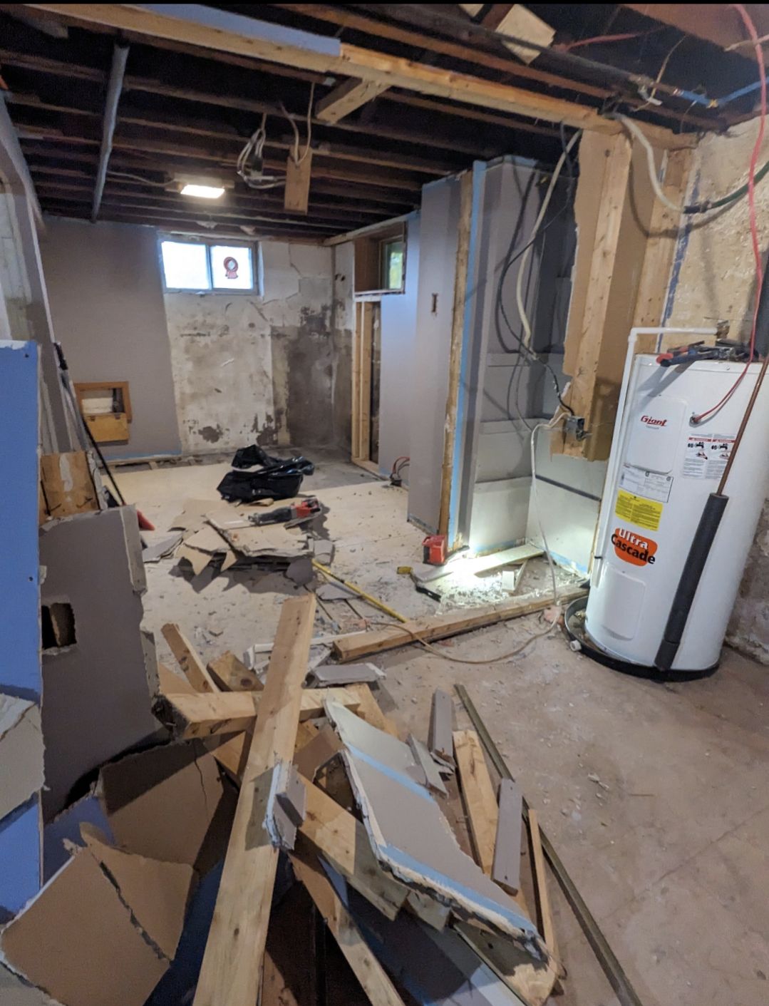 Basement suite during demolition before the kitchenette went in, Riverview NB