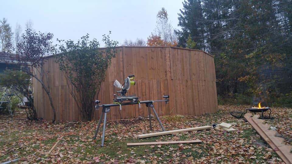 Curved privacy wall built around an above-ground pool deck, Moncton NB