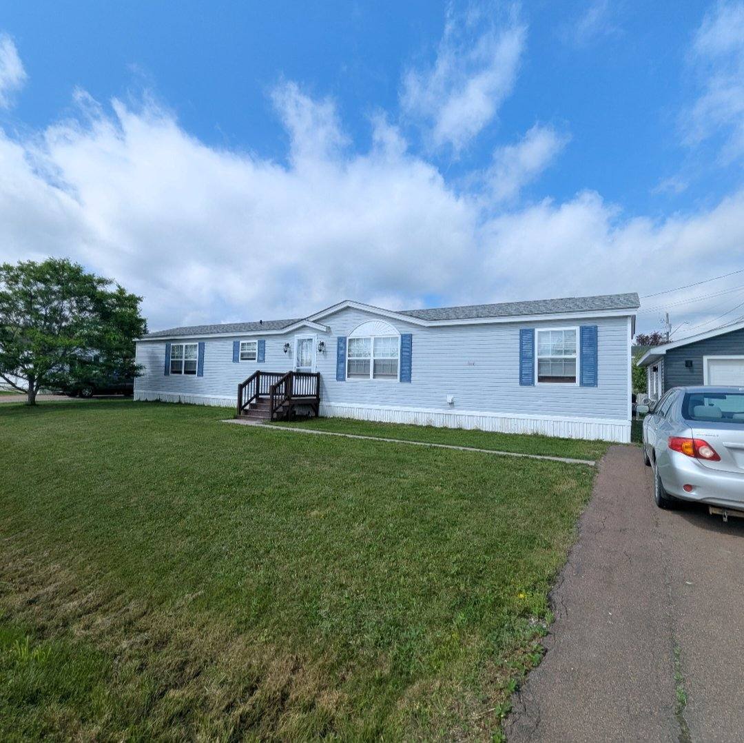Home exterior before new siding installation, Moncton NB